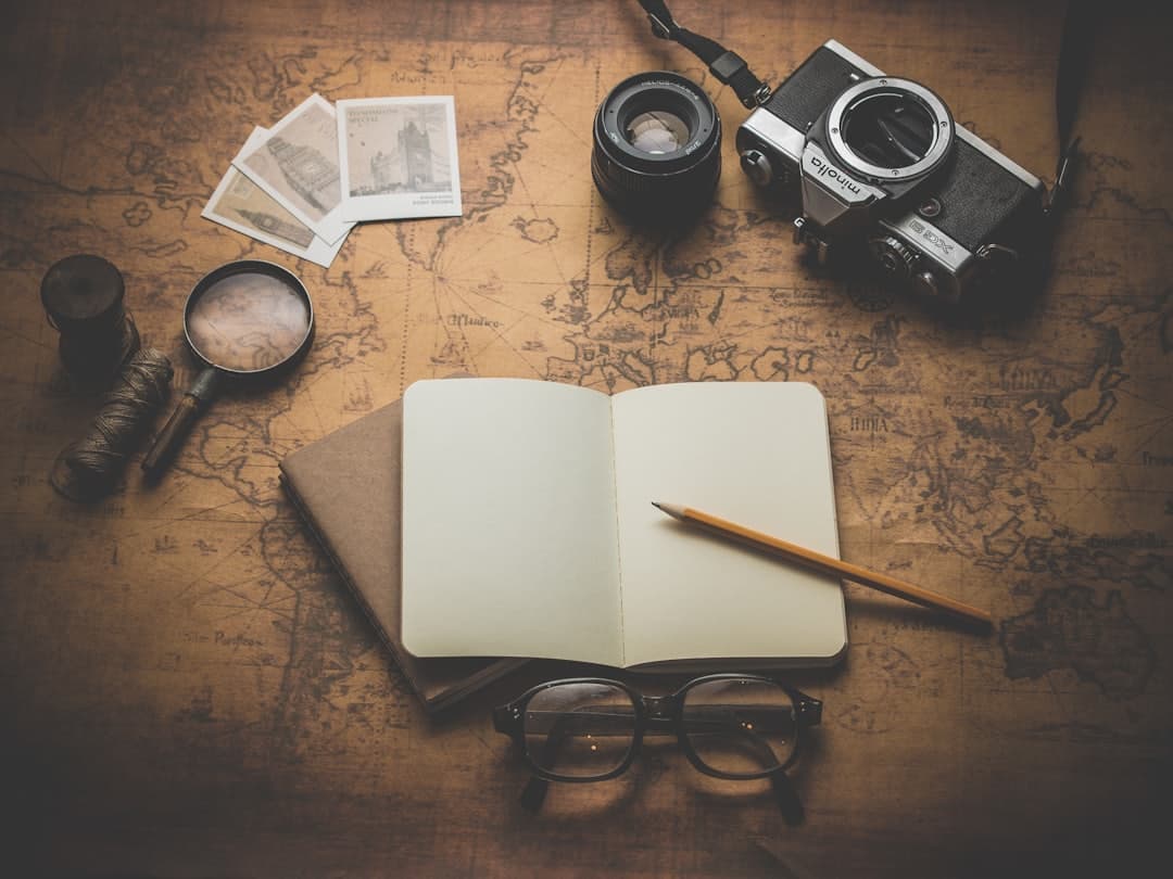 Photography gear laid on a map